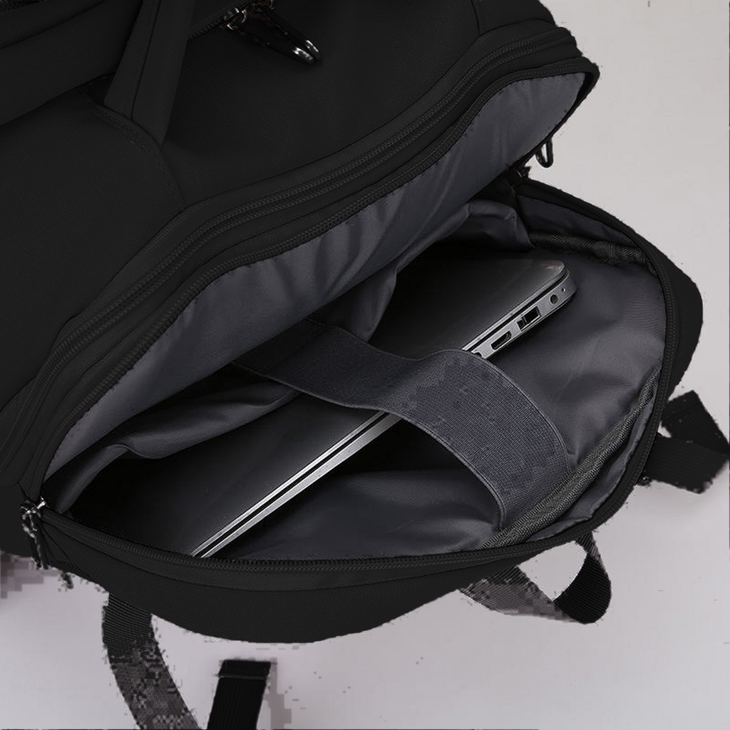TAKT 20 under-seat cabin backpack in Black, padded laptop sleeve with a laptop in place